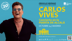 Cartel del concierto de Carlos Vives en la Puerta de Alcalá de Madrid por el Día de la Hispanidad.