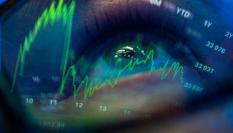 El Índice de Down Jones, reflejados en el ojo de una persona.