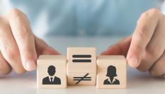 Ilustración con dados que recrean la lucha por la igualdad real entre sexos.