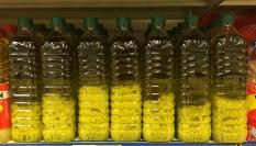 Grumos blancos presentes en botellas de aceite de oliva.