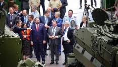 La ministra de Defensa, Margarita Robles, y el presidente del Principado en funciones, Adrián Barbón, durante una visita a la fábrica de Santa Bárbara Sistemas en Trubia, a 30 de junio de 2023, en Turbia, Asturias