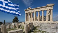 Bandera griega con el Partenón de Atenas de fondo