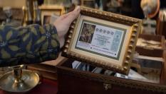 Décimo enmarcado del 'spot' de la Lotería de Navidad 2025.