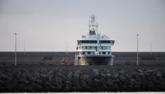The cruise ship MV Hondius arrives at the port of Granadilla de Abona after being affected by a hantavirus outbreak, in Tenerife, Spain, May 10, 2026. REUTERS/Pedro Nunes