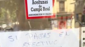 El cartel que cuelgan en un bar de Madrid sobre el pago en efectivo sirve un inmenso debate en bandeja