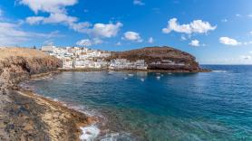 "Que no haya bares es un filtro natural que ojalá no se pierda nunca": los vecinos defienden el refugio de Tufia, una de las playas españolas más virales en redes