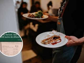 Una camarera, llevando varios platos a la mesa en un restaurante.