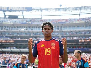 EAST RUTHERFORD, NEW JERSEY - JULY 19: Lamine Yamal #19 of Spain prays before the FIFA World Cup 2026 Final match between Spain and Argentina at New York New Jersey Stadium on July 19, 2026 in East Rutherford, New Jersey. (Photo by Alex Pantling - FIFA/FIFA via Getty Images)