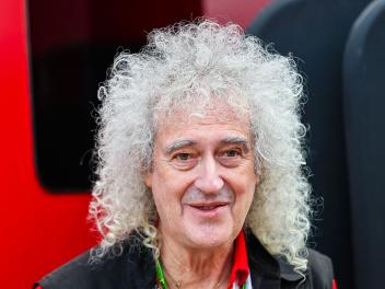 NORTHAMPTON, ENGLAND - JULY 5: Sir Brian May walks in the paddock during the F1 Grand Prix of Great Britain at Silverstone Circuit on July 5, 2026 in Northampton, United Kingdom. (Photo by Kym Illman/Getty Images)