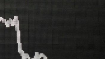 El rescate de Cataluña lleva a la bolsa a su nivel más bajo desde 2003; la prima sigue disparada