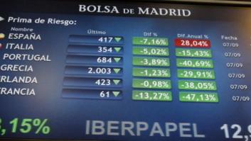 La prima de riesgo baja por primera vez desde abril de los 400 puntos tras la decisión de Alemania