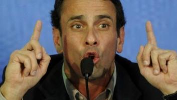 Los candidatos a la presidencia de Venezuela, Maduro y Capriles, se lanzan críticas ante las elecciones del 14 de abril