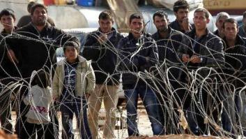 Merkel califica de 'completamente inaceptable' la política de refugiados de Erdogan