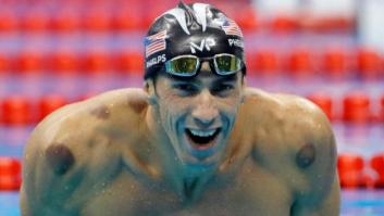 Un fotógrafo capta la cara que se le queda al gran rival de Phelps cuando ve que va a perder