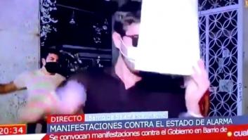 Un exaltado en el barrio de Salamanca casi se come el micrófono de Cuatro al grito de "¡Viva Hitler!"