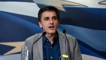 Grecia salda su deuda con el FMI y reabre sus bancos