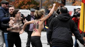 Manifestantes franquistas intentan agredir a tres activistas de FEMEN que protestaron contra la marcha