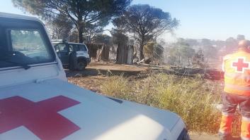 Unas 200 chabolas calcinadas en un incendio en Huelva que deja varios heridos y una detenida