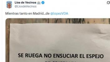 Cuelgan un cartel pidiendo no ensuciar los cristales, un vecino reacciona con un "amargados" y llega otro y su respuesta hay que leerla