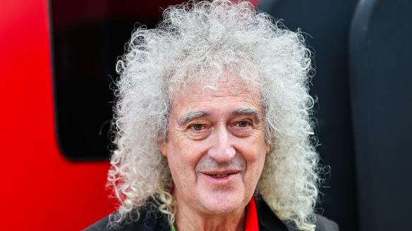 NORTHAMPTON, ENGLAND - JULY 5: Sir Brian May walks in the paddock during the F1 Grand Prix of Great Britain at Silverstone Circuit on July 5, 2026 in Northampton, United Kingdom. (Photo by Kym Illman/Getty Images)