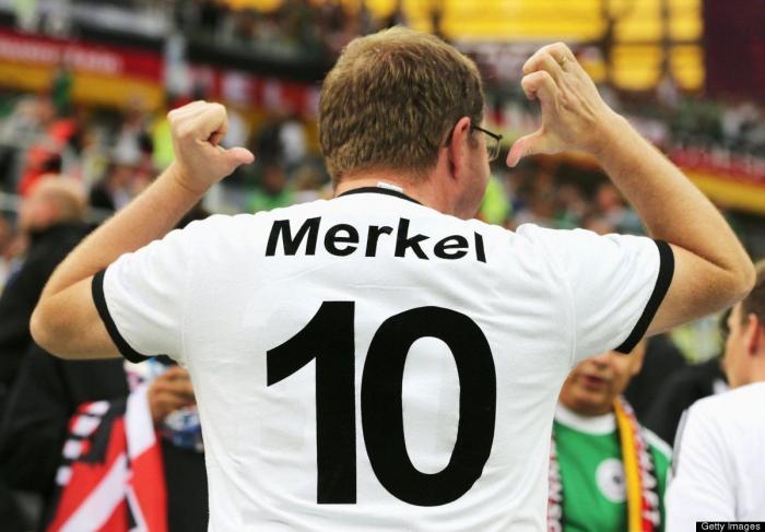 Merkel causa furor en el partido Grecia- Alemania (FOTOS)