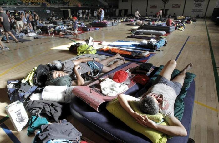 Miles de personas acompañan en Sol a la Marcha Negra en la 'noche minera' (VÍDEO, FOTOS)