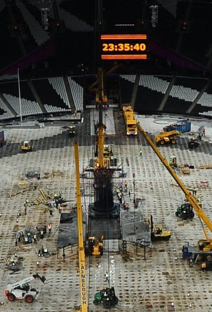 El pebetero olímpico se apaga por unas horas por cambio de emplazamiento (FOTOS)