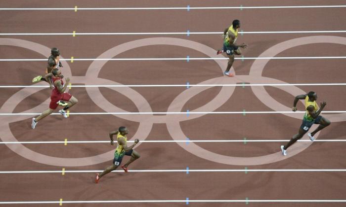 Bolt se lesiona en su última carrera y priva a Jamaica de medalla en el Mundial