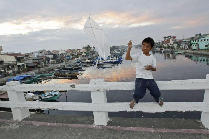 El tifón 'Bopha' deja al menos 238 muertos a su paso por Filipinas (FOTOS)