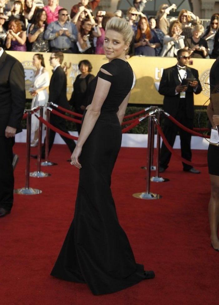 Una fiesta, tres escotes rarunos y tres vestidos : Cara Delevingne, Kim Kardashian y Miranda Kerr