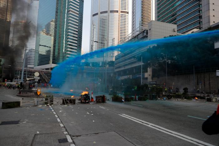 Un herido de bala en las protestas de Hong Kong en pleno 70ª aniversario de la China comunista
