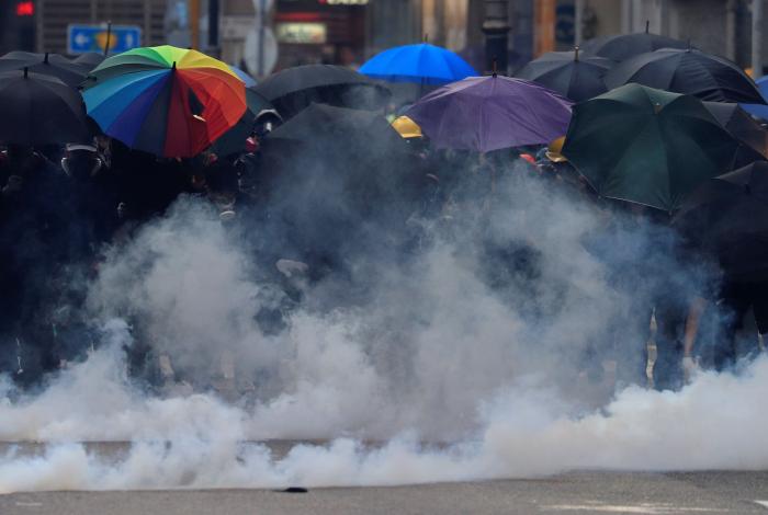 Un herido de bala en las protestas de Hong Kong en pleno 70ª aniversario de la China comunista