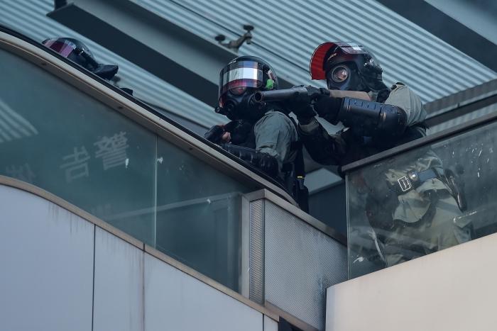 Un herido de bala en las protestas de Hong Kong en pleno 70ª aniversario de la China comunista