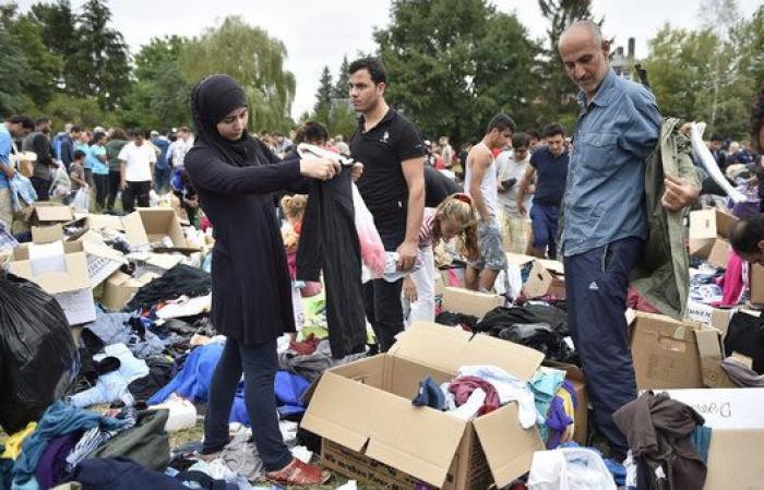 Pese a la amenaza nazi han hecho su fiesta de bienvenida a refugiados