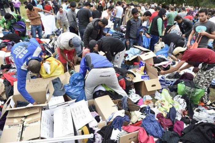 Pese a la amenaza nazi han hecho su fiesta de bienvenida a refugiados