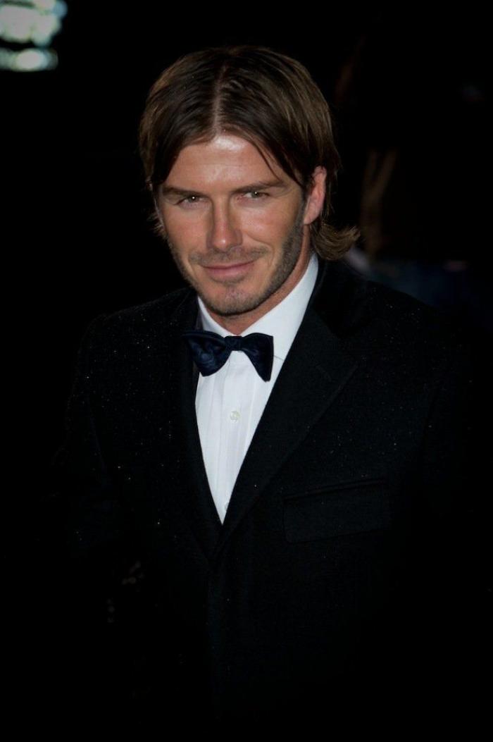 Las chanclas de David Beckham son lo mejor de esta foto