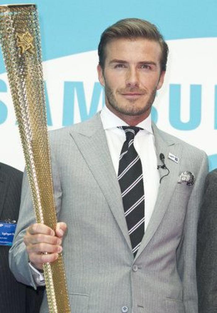 Las chanclas de David Beckham son lo mejor de esta foto