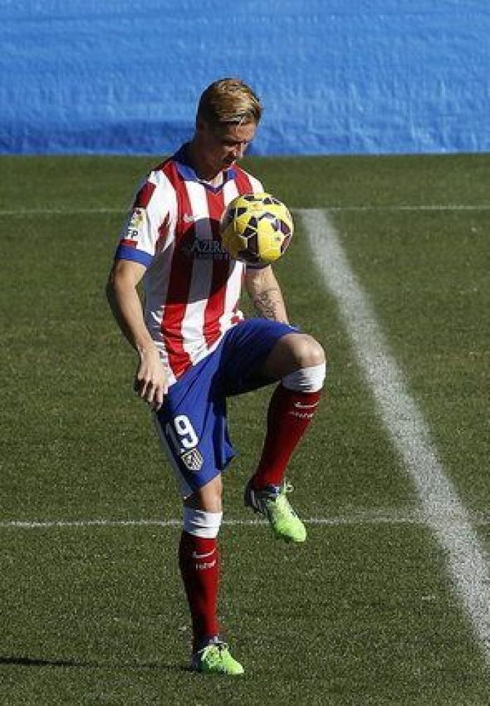 Fernando Torres vuelve a vestir de rojiblanco ante 40.000 aficionados (FOTOS)