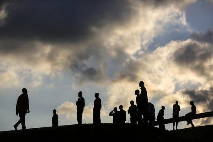 Un grupo de fotoperiodistas vende sus imágenes para ayudar a los refugiados