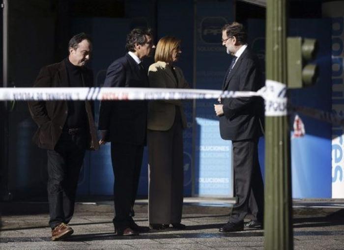 Un hombre que transportaba dos bombonas de butano empotra su coche contra la sede del PP