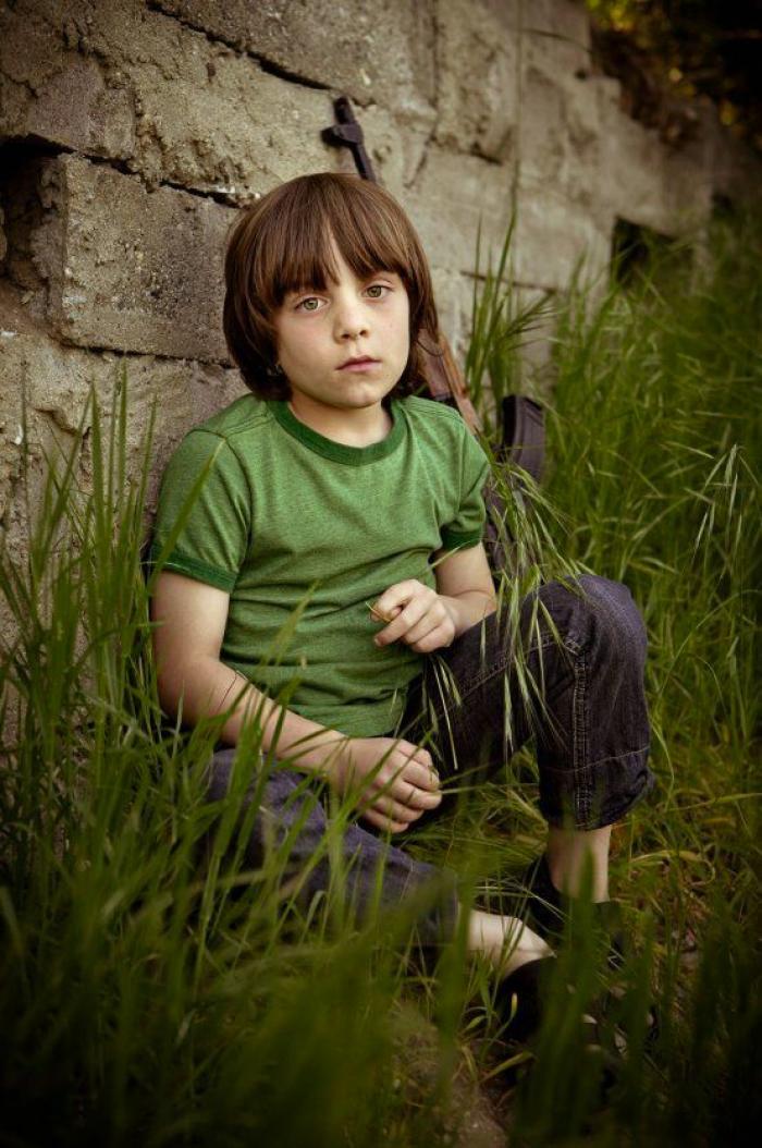 Fotografías de niños de EEUU con armas para denunciar la masacre de Newtown un año después