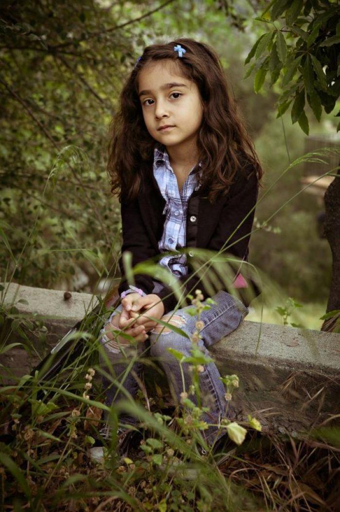 Fotografías de niños de EEUU con armas para denunciar la masacre de Newtown un año después