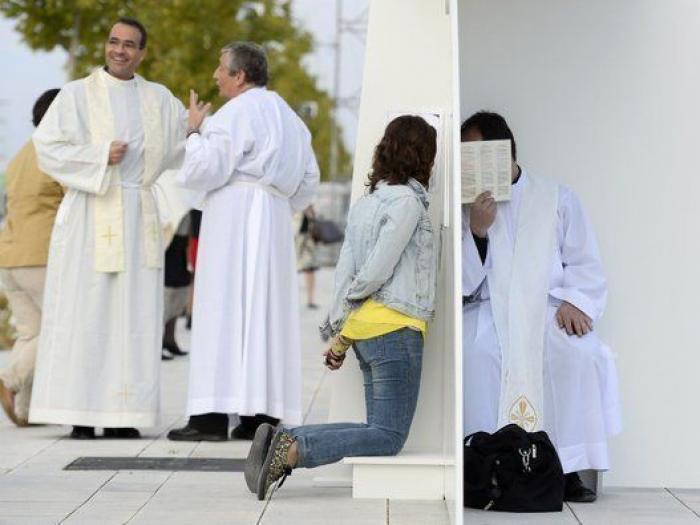 Guindos y Fernández Díaz asisten a una misa del OPUS en Madrid (FOTOS)