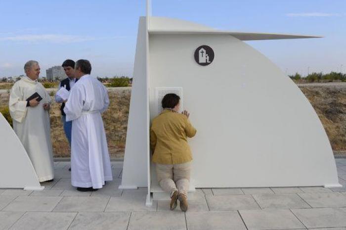 Guindos y Fernández Díaz asisten a una misa del OPUS en Madrid (FOTOS)