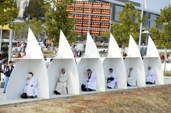 Guindos y Fernández Díaz asisten a una misa del OPUS en Madrid (FOTOS)