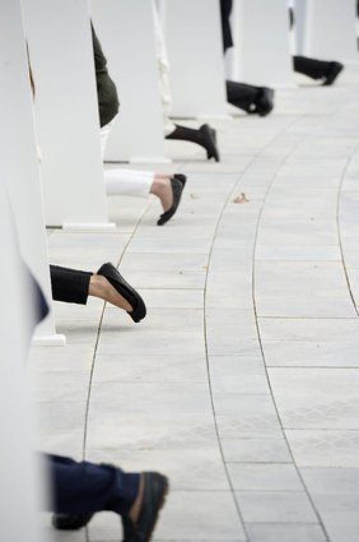 Guindos y Fernández Díaz asisten a una misa del OPUS en Madrid (FOTOS)