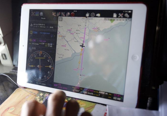 Avión de Malasia: familiares retienen a personal de la compañía en un hotel