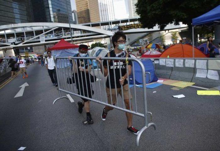 Desalojo de las protestas en Hong Kong: la policía desmonta el campamento de los manifestantes (FOTOS)