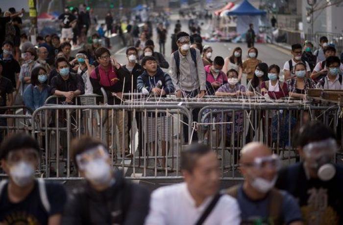Desalojo de las protestas en Hong Kong: la policía desmonta el campamento de los manifestantes (FOTOS)