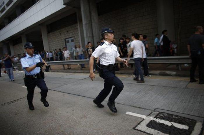 Desalojo de las protestas en Hong Kong: la policía desmonta el campamento de los manifestantes (FOTOS)